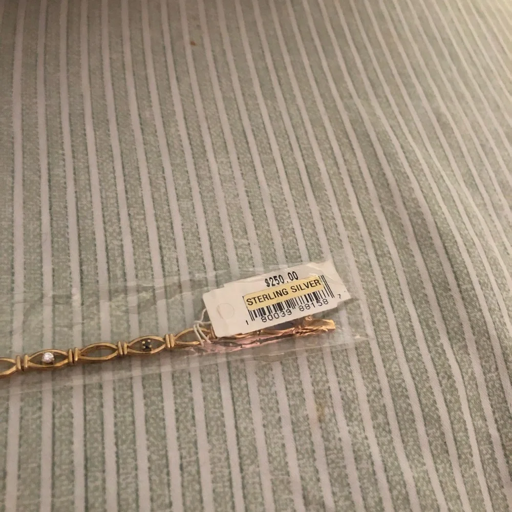 This Silver Gold plated Bracelet with diamond and sapphire accents is Beautiful. - Picture 6 of 12